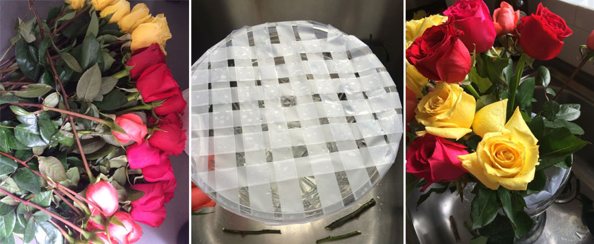 flowers, a vase with a tape grid and the beginning of an arrangement